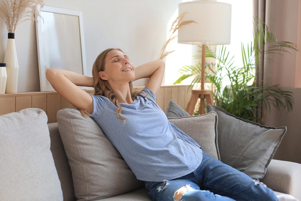 indoor air quality in Opelika, AL, relaxed woman sitting in a couch